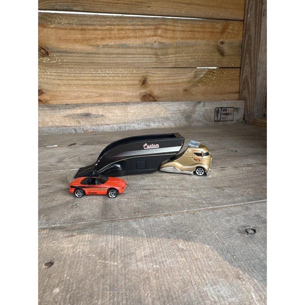 Vintage 1999 Hot wheels Custom Gold Semi Truck With Little Car
